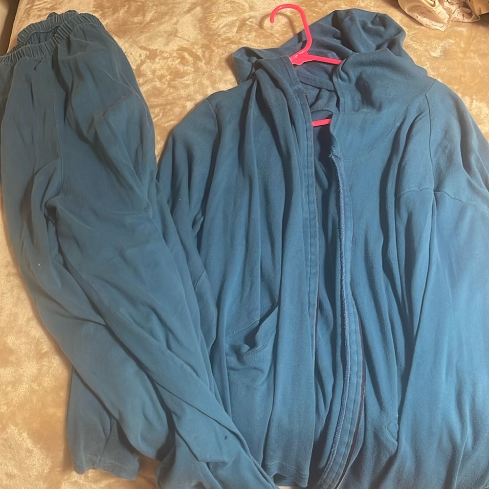 blue sweatsuit